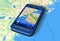 Smartphone with GPS navigator on map