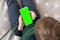 Smartphone with a green screen in hand child . Phone a for keying is holding kid