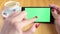 Smartphone green screen woman hand
