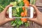 Smartphone with information of calories in vegetables.