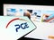 Smartphone with logo of company PGE Polska Grupa Energetyczna S.A. on screen in front of business website.