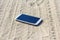 Smartphone lost in the sand