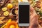 Smartphone mock up with autumn season decoration