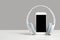 Smartphone mockup display with grey wireless headphones on gray background