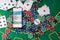 Smartphone with poket table on screen, playing cards and chip cards on poker table. Online casino.