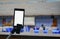 Smartphone take a photo on screen of the meeting room business select focus with shallow depth of field