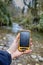 smartphone tracking travel on mountain trails.