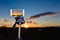Smartphone on tripod capturing image of stunning sundown
