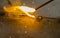 SMAW â€“ Shielded matal arc welging and welding flame at spark point.