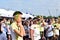 Smeared with colored dyes, young people having fun at the Color Manila Glitter Run