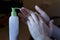 Smearing moisturizer on damaged hands of a cream jar with dispenser