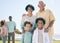 Smile, beach and portrait of children with grandparents enjoy holiday, summer vacation and weekend. Black family, happy