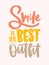 Smile Is the Best Outfit inscription handwritten with elegant calligraphic cursive font. Slogan written with colorful