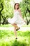 Smile girl dance in white dress