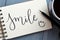 SMILE hand-lettered in notepad