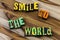 Smile to world stay happy face positive attitude