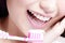 Smile woman brush teeth