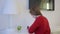 Smileing woman think and start to write letter on a white table