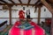 Smilen, Bulgaria - Indoor interior of old bulgarian house, ethnography, traditional costumes from Bulgaria, hanged on a wall