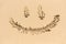 Smiley drawing on a sand