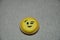 A smiley emoji biscuit