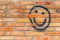 Smiley face drawn on a wall