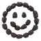 Smiley face made out of blackberries