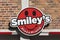 Smiley`s Pizza delivery service logo