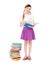 Smiley schoolgirl standing near books