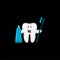 A smiley tooth holding a toothbrush with a tube of toothpaste isolated on black background