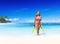 Smilig Woman with Scuba Gear on a Tropical Beach