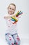 Smiling Active Caucasian Young Girl With Messy Colorful Palms