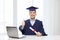 Smiling adult student in mortarboard with diploma