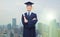 Smiling adult student in mortarboard with diploma