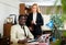 Smiling african american businessman with female colleague in office