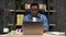 Smiling African American businessman listens online employees laptop webcam