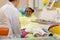 Smiling African American girl looking at a doctor