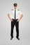 Smiling airline captain with hands on hips