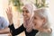 Smiling Arabic woman participate in team meeting in office