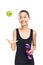 Smiling Asian athlete holding sipper bottle and throwing up apple