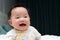 Smiling Asian baby