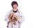 Smiling Asian female veterinary doctor hugging pet dog