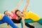 Smiling Asian teenage girl practicing gymnastics