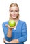 Smiling attractive woman holding green apple