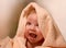 Smiling baby in bath towel