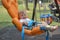 Smiling baby boy sitting in a orange swing