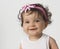 Smiling baby in pink headband