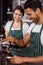 Smiling baristas working