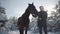 Smiling bearded man stroking on head adorable brown thoroughbred horse standing between fir trees against the sun