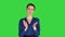 Smiling beautiful business woman clapping hands on a Green Screen, Chroma Key.